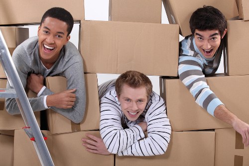 Professional movers handling furniture during a Barnsbury relocation
